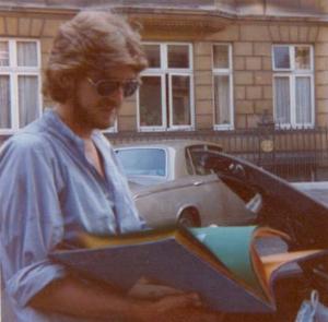 Peter Looking at the Scrapbook